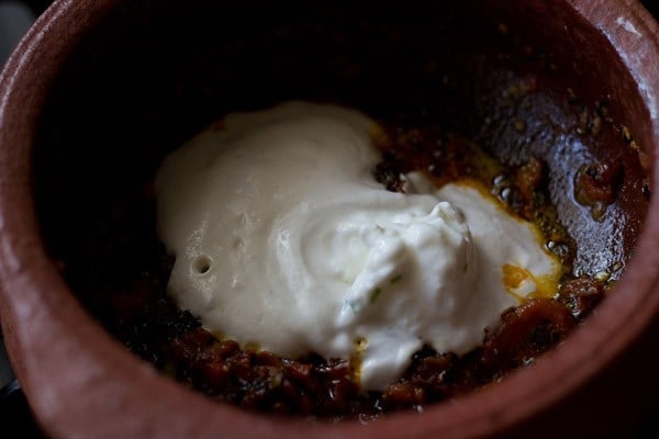 prepared cashew paste and curd added to handi. 