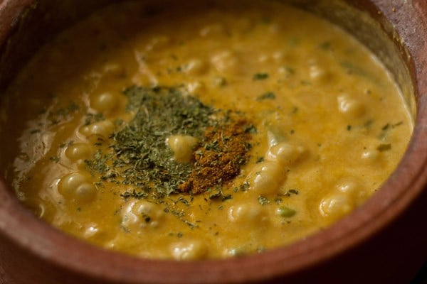 crushed dried fenugreek leaves and garam masala powder added to gravy. 