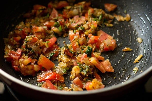 add tomatoes - making veg Kolhapuri recipe