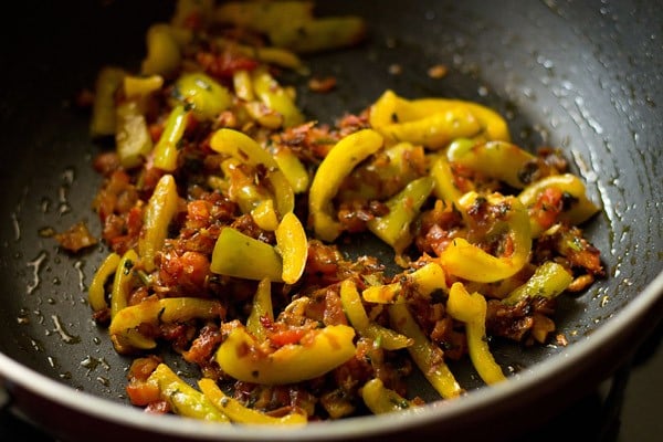 add capsicum - making veg Kolhapuri recipe