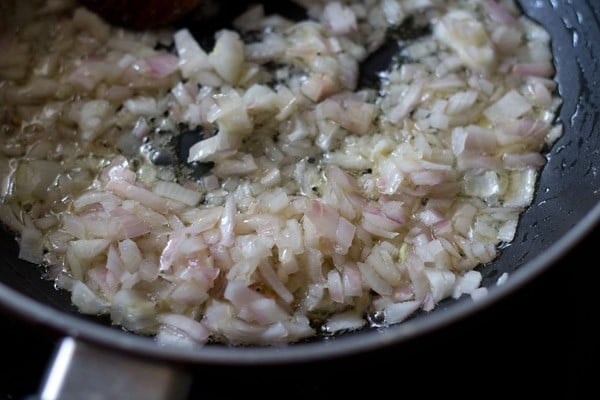 saute onions to make veg Kolhapuri recipe