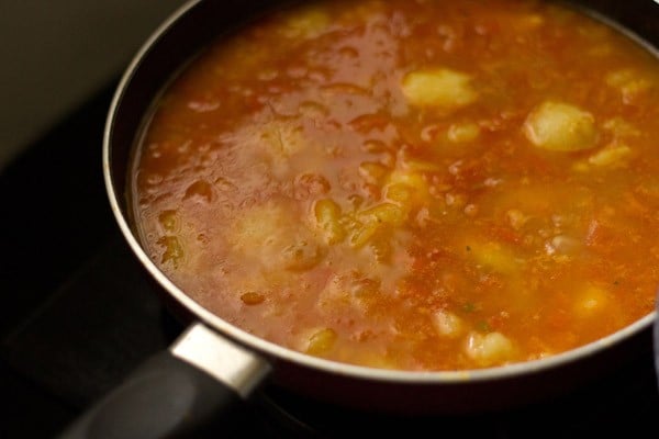 simmering aloo rasedar gravy. 