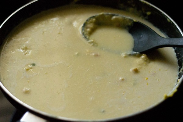 water added to soup mixture in pan