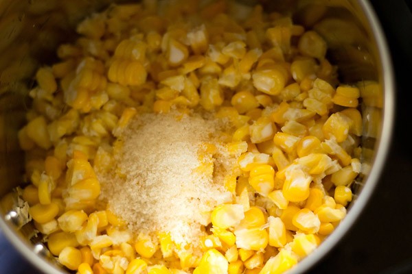 corn kernels in a grinder jar