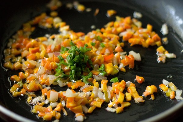 sauteing the veggies in the pan