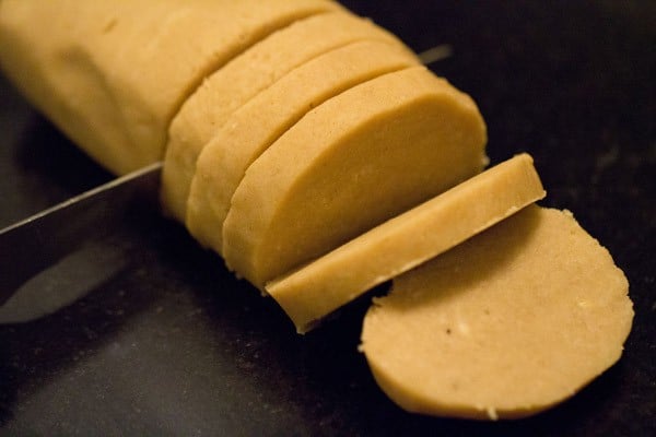 slicing chilled discs of dough