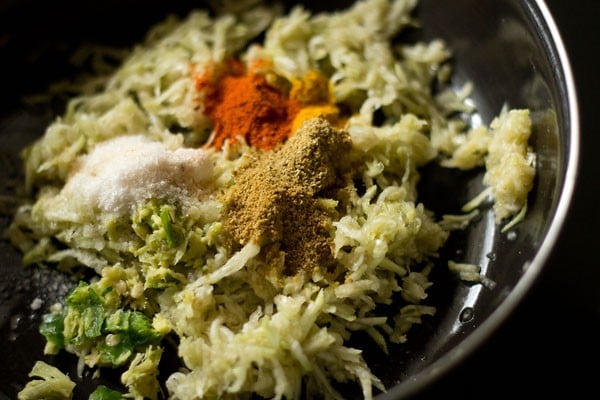 ginger-green chili paste, ground spices and salt added to grated bottle gourd for dudhi na thepla.