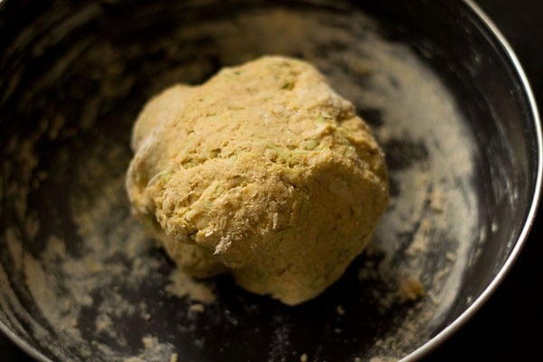 making dudhi na thepla dough. 