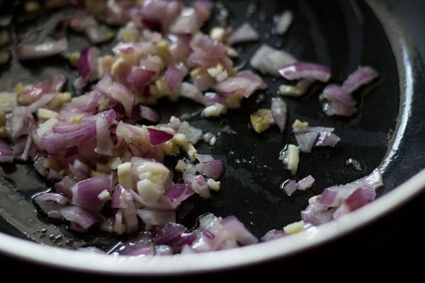 sauteing onions in the pan