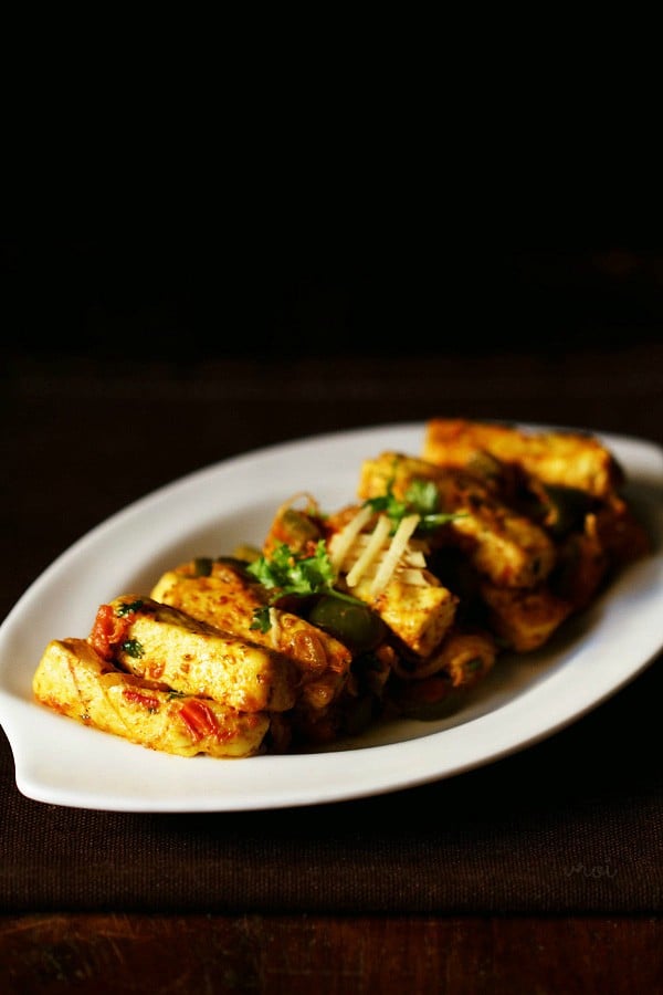 paneer khurchan served on a white plate
