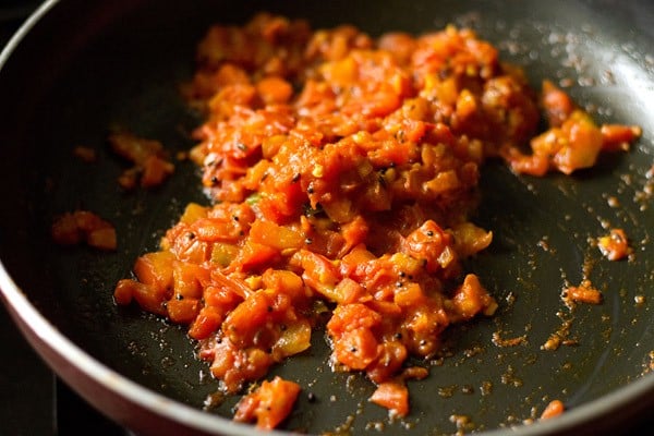 sautéing tomato mixture. 