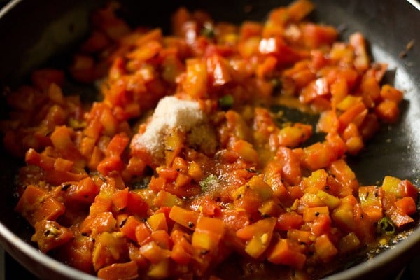 sugar and salt added to tomato mixture. 