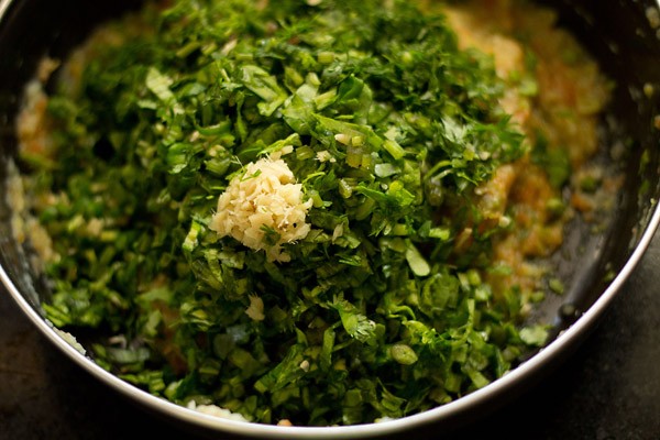 spinach, coriander and green chillies in a bowl