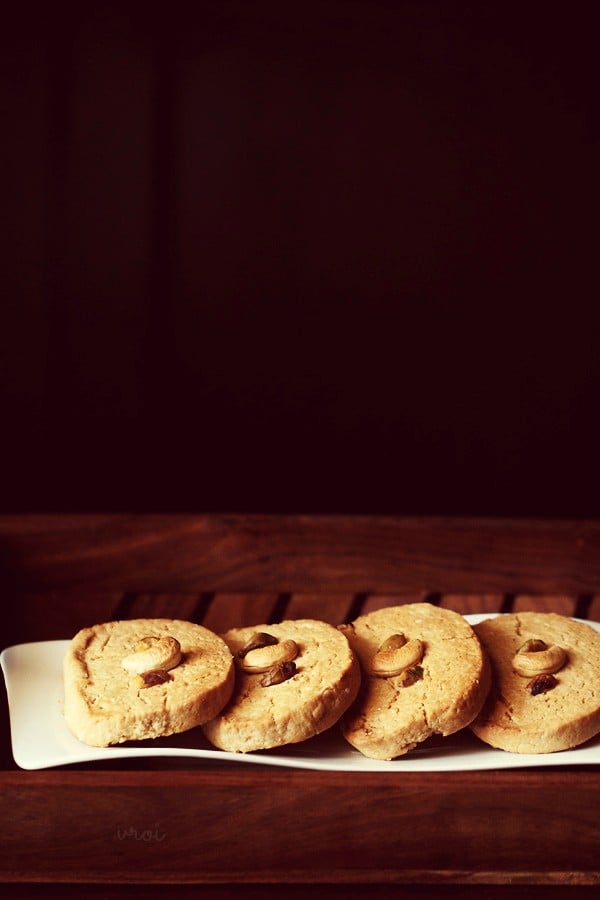 wholewheat butter cookies stacked in a white tray