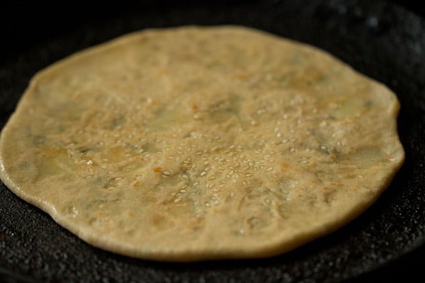 roasting aloo kulcha with ghee