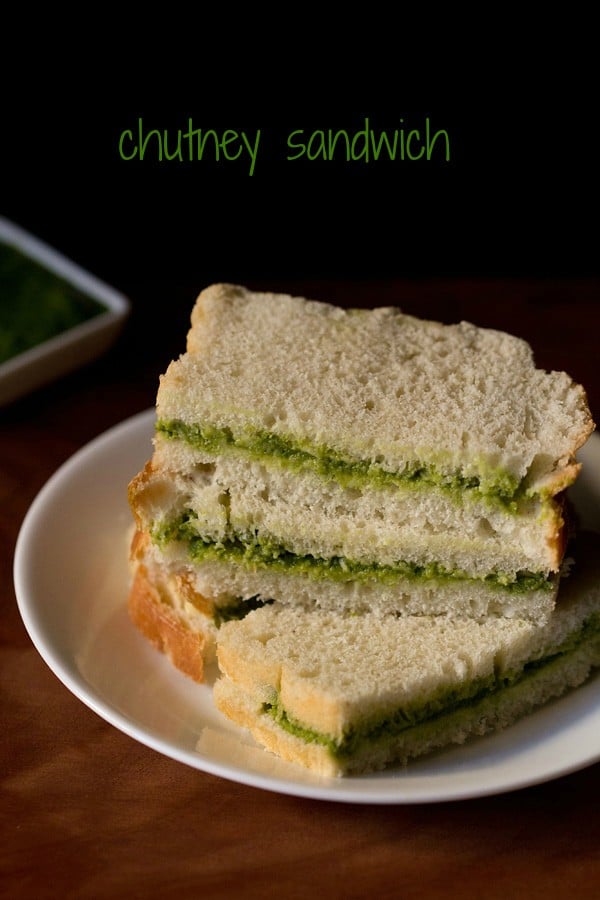 chutney sandwich slices served on top of each other on a white ceramic plate with text layover.