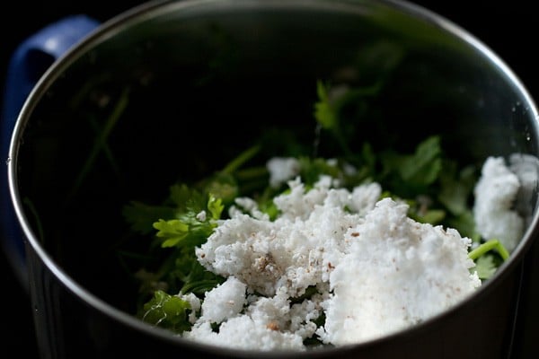 roughly chopped coriander leaves, grated fresh coconut and chopped green chili added in a grinder jar. 