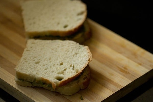 bread slices brought together to make chutney sandwiches. 