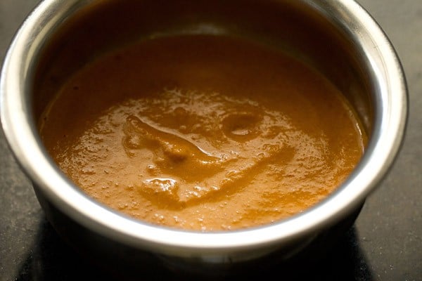 prepared chutney added in a steel bowl. 