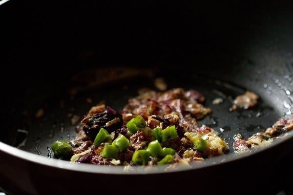 chopped green chilies added in the pan. 