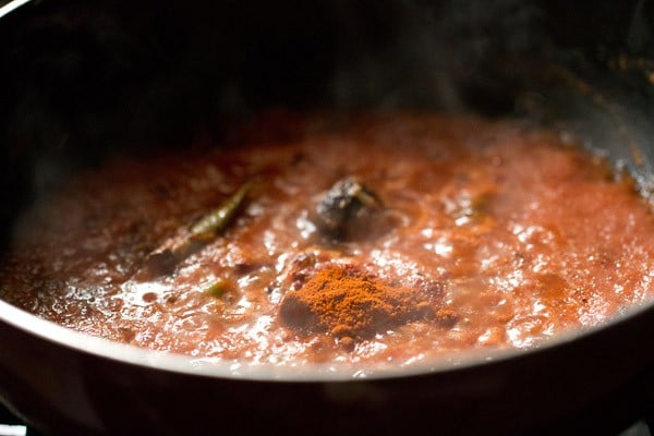 red chili powder added in the pan. 