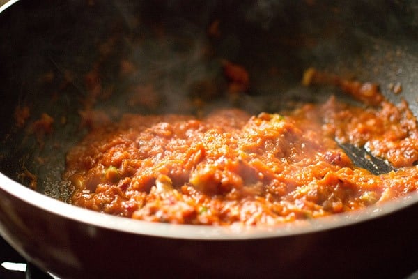 sautéing the tomato puree and and other ingredients. 