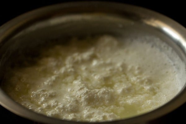 close up image of curdled milk for making chenna