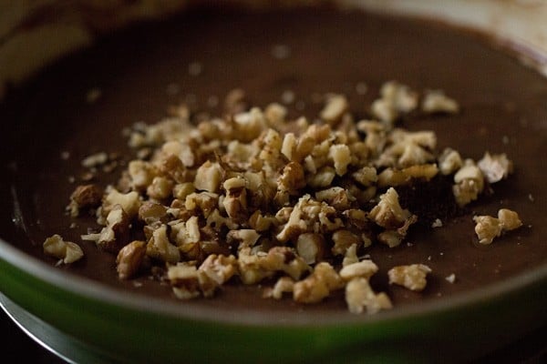 Chopped walnuts added in the fudge mixture in the pan. 