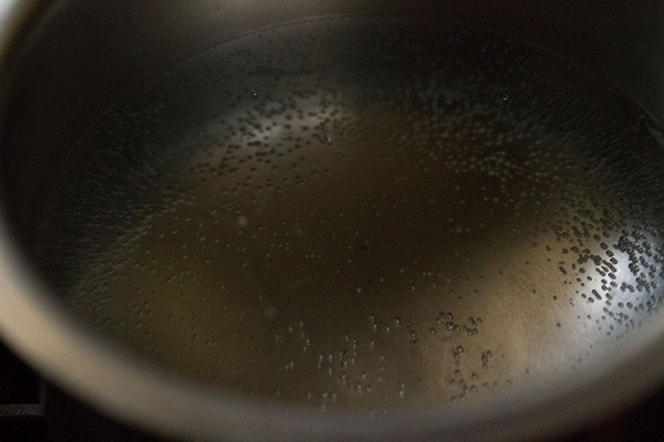 water being heated in a pot for a double boiler.