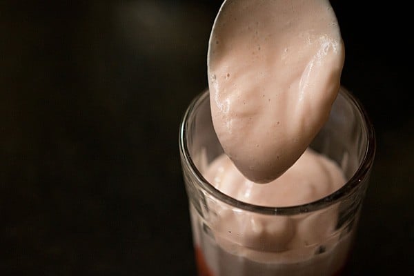 strawberry mousse spooned in shot glasses. 