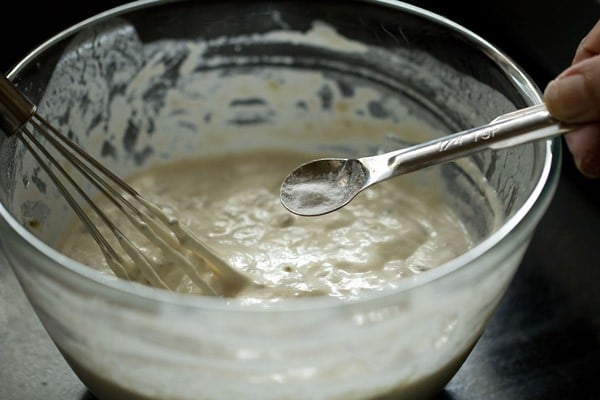 baking soda being added to malpua batter