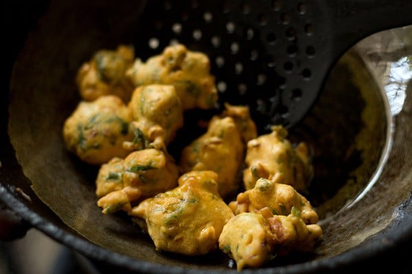 removing fried methi pakora