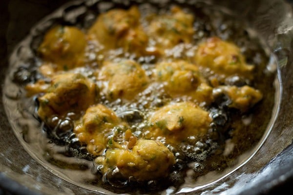 frying methi pakora till crisp