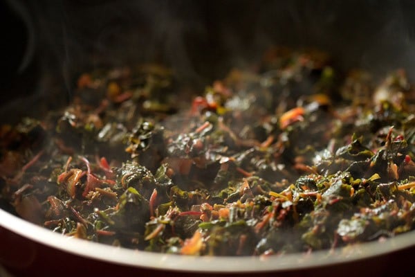 cooking tambdi bhaji