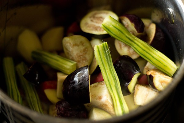 chopped mixed vegetables added to pan. 