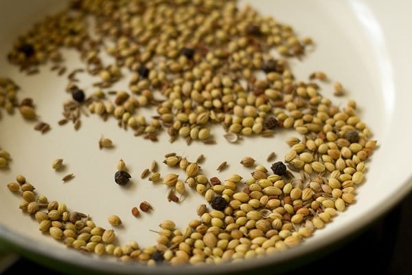 roasted whole spices in pan. 