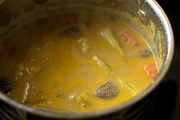 simmering kara kuzhambu. 