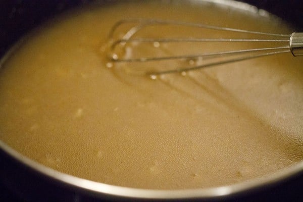 applesauce cake batter mixture after whisking wet ingredients.