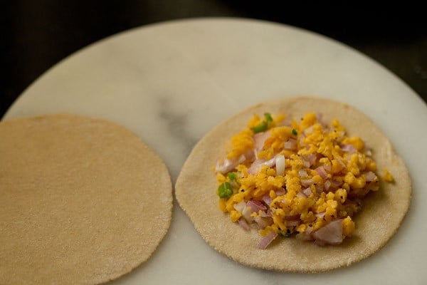 adding cheese stuffing for paratha