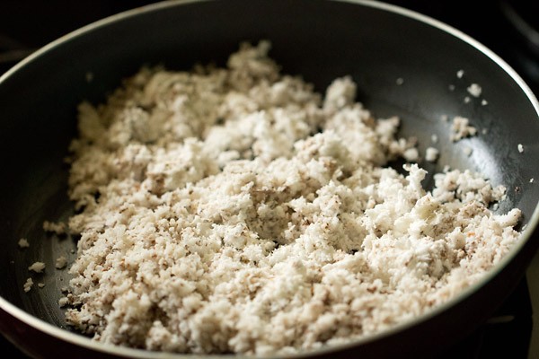 sauting fresh coconut for Coconut ladoo recipe