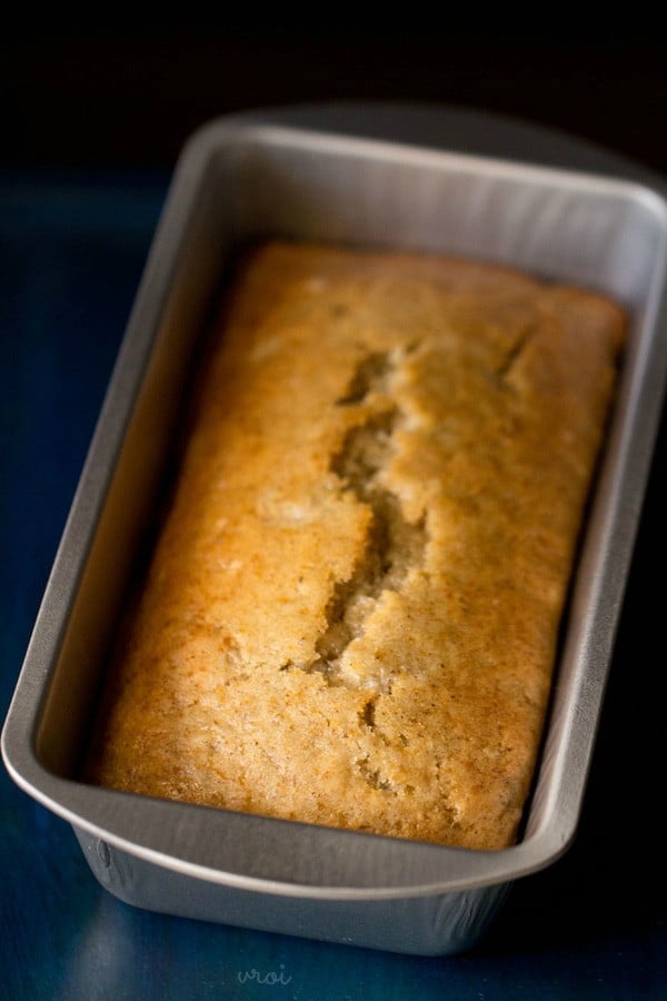 hero shot of eggless applesauce cake (vegan sponge cake) in a loaf tin.