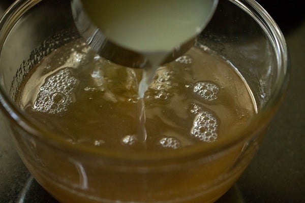 adding lemon juice to sugar syrup