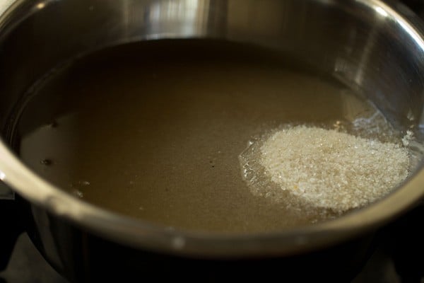 water and sugar in a pan for lemon squash