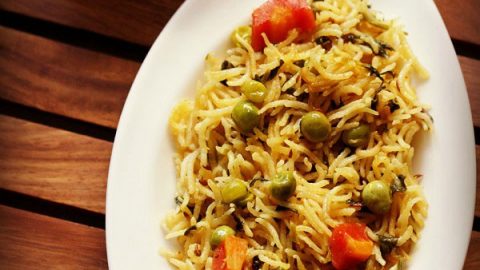 methi pulao served on a white plate.