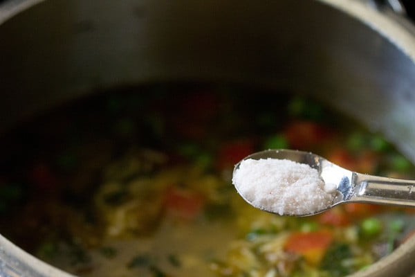 salt added to methi rice mixture in pressure cooker