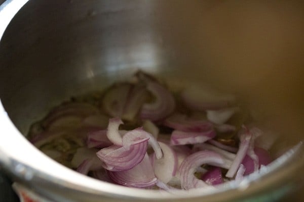 ½ cup thinly sliced onions added to pressure cooker