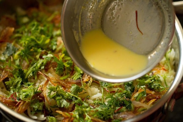 saffron infused milk being added