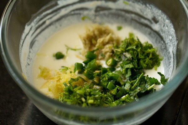green chillies, ginger, herbs added to curd