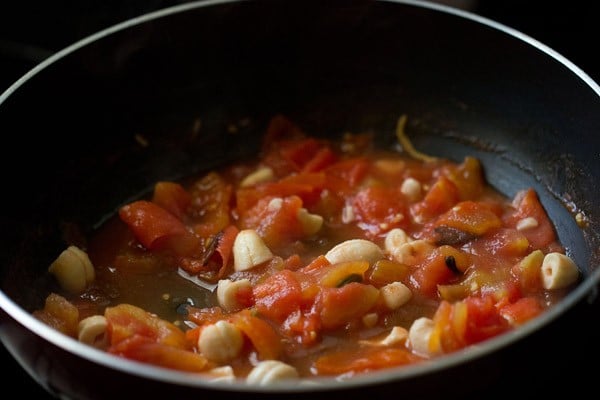 tomatoes are softened and there is leftover tomato juice/stock in the pan