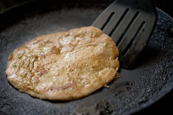 frying second side of rajgira paratha